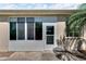 Enclosed Florida room with sliding glass doors and adjacent door at 1032 Radison Ave # 2, Sun City Center, FL 33573