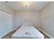 Bedroom with double closet and a queen bed at 1032 Radison Ave # 2, Sun City Center, FL 33573