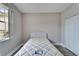 Simple bedroom with a double bed and closet at 1032 Radison Ave # 2, Sun City Center, FL 33573