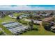 Aerial view of community features including courts and roads at 1032 Radison Ave # 2, Sun City Center, FL 33573