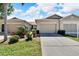 Front view of a charming two-story house at 1032 Radison Ave # 2, Sun City Center, FL 33573