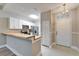 Modern kitchen featuring butcher block countertops and stainless steel appliances at 1032 Radison Ave # 2, Sun City Center, FL 33573