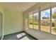 Sunroom with sliding glass doors and yard view at 1032 Radison Ave # 2, Sun City Center, FL 33573