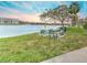 Enjoy serene waterfront views from this lakeside picnic area at 3753 Lake Bayshore Dr # H305, Bradenton, FL 34205