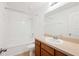 Clean bathroom with a shower/tub combo, vanity, and mirrored medicine cabinet at 37658 Aaralyn Rd, Zephyrhills, FL 33542