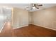 Hallway with wood-look floors and access to other rooms at 37658 Aaralyn Rd, Zephyrhills, FL 33542