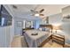 Bright bedroom with a comfortable bed and plenty of storage at 909 Birdie Way, Apollo Beach, FL 33572