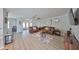 Living room with two brown couches and a coffee table at 909 Birdie Way, Apollo Beach, FL 33572