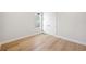 Bright bedroom with hardwood floors, a double door closet and a window at 4010 W Watrous Ave, Tampa, FL 33629