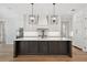 Spacious kitchen with a large center island, modern appliances, and ample counter space at 4010 W Watrous Ave, Tampa, FL 33629