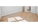 Spacious main bedroom with hardwood floors and plenty of natural light at 4010 W Watrous Ave, Tampa, FL 33629