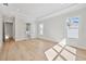 Bright and spacious main bedroom features a tray ceiling, hardwood floors, and an ensuite bathroom at 4010 W Watrous Ave, Tampa, FL 33629