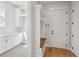 Mudroom area featuring a hall tree with storage and hardwood floors at 4010 W Watrous Ave, Tampa, FL 33629