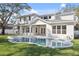 Backyard features a luxurious pool and spa, perfect for relaxation and entertaining at 4010 W Watrous Ave, Tampa, FL 33629