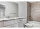 Clean bathroom, featuring a shower/tub combo and granite countertop at 16111 69Th E Ln, Parrish, FL 34219