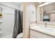 Small bathroom with shower/tub combo and white vanity at 704 S Newport Ave, Tampa, FL 33606