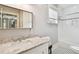 Bathroom with marble countertop and bathtub at 704 S Newport Ave, Tampa, FL 33606