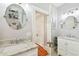 Bathroom with double vanity and marble countertop at 704 S Newport Ave, Tampa, FL 33606