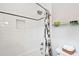 Bathroom with white tile and shower/tub combo at 704 S Newport Ave, Tampa, FL 33606