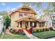 A beautiful two-story house with a red tile roof and manicured landscaping at 704 S Newport Ave, Tampa, FL 33606