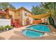 Inviting backyard oasis with a sparkling pool and spa at 704 S Newport Ave, Tampa, FL 33606