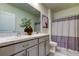 Modern bathroom with double vanity and shower/tub combo at 7516 Cypress Walk Dr, New Port Richey, FL 34655