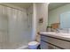 Clean bathroom with shower/tub combo, single vanity, and neutral colors at 7516 Cypress Walk Dr, New Port Richey, FL 34655