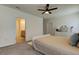 Main bedroom with ensuite bathroom access and dresser at 7516 Cypress Walk Dr, New Port Richey, FL 34655