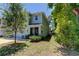 Charming two-story home with a landscaped front yard at 7516 Cypress Walk Dr, New Port Richey, FL 34655