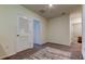 Upstairs hallway with carpet, access to bedrooms and bathroom at 7516 Cypress Walk Dr, New Port Richey, FL 34655