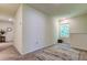 Bright loft area with natural light and carpet flooring at 7516 Cypress Walk Dr, New Port Richey, FL 34655