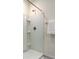 Clean and simple shower with neutral color palette at 7516 Cypress Walk Dr, New Port Richey, FL 34655