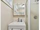 Small bathroom with single sink vanity and shower at 1508 Delaware Ne Ave, St Petersburg, FL 33703