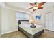 Serene bedroom with a comfy bed and plenty of natural light at 1508 Delaware Ne Ave, St Petersburg, FL 33703