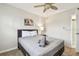 Bedroom with a ceiling fan and nightstand at 1508 Delaware Ne Ave, St Petersburg, FL 33703