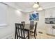 Dining area with table and chairs near kitchen at 1508 Delaware Ne Ave, St Petersburg, FL 33703