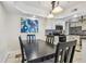 Kitchen and dining area view, modern white cabinets at 1508 Delaware Ne Ave, St Petersburg, FL 33703