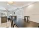 Bright dining area with table and chairs, view into living room at 1508 Delaware Ne Ave, St Petersburg, FL 33703