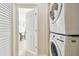 Laundry closet with stackable washer and dryer at 1508 Delaware Ne Ave, St Petersburg, FL 33703