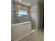 Modern bathroom with a large walk in shower at 1574 Running Tide Pl, Sarasota, FL 34240