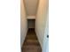 Long, narrow storage closet with wood flooring at 1574 Running Tide Pl, Sarasota, FL 34240