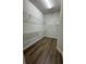 Spacious walk-in closet with wire shelving at 1574 Running Tide Pl, Sarasota, FL 34240