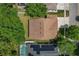 Aerial view showing house, pool, and solar panels at 12814 Cattail Shore Ln, Riverview, FL 33579