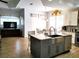Open-concept kitchen with a stainless steel sink and appliances, and a large dining area at 3639 Hurston St, New Port Richey, FL 34655