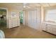 Spacious Primary bedroom with double dresser and access to bathroom at 116 W Saint Johns Way, Apollo Beach, FL 33572