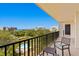 Relax on the balcony with outdoor seating and scenic views of the pool and surrounding landscape at 150 Belleview Blvd # 602, Belleair, FL 33756