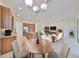 Kitchen and dining area with a view of the living room at 1817 Pacific Dunes Dr, Sun City Center, FL 33573