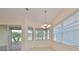 Bright dining room with plenty of natural light and a chandelier at 1817 Pacific Dunes Dr, Sun City Center, FL 33573