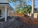 New construction home with covered patio and fenced backyard at 3707 W San Juan St, Tampa, FL 33629