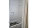 Bathroom with white subway tile and bathtub at 3707 W San Juan St, Tampa, FL 33629